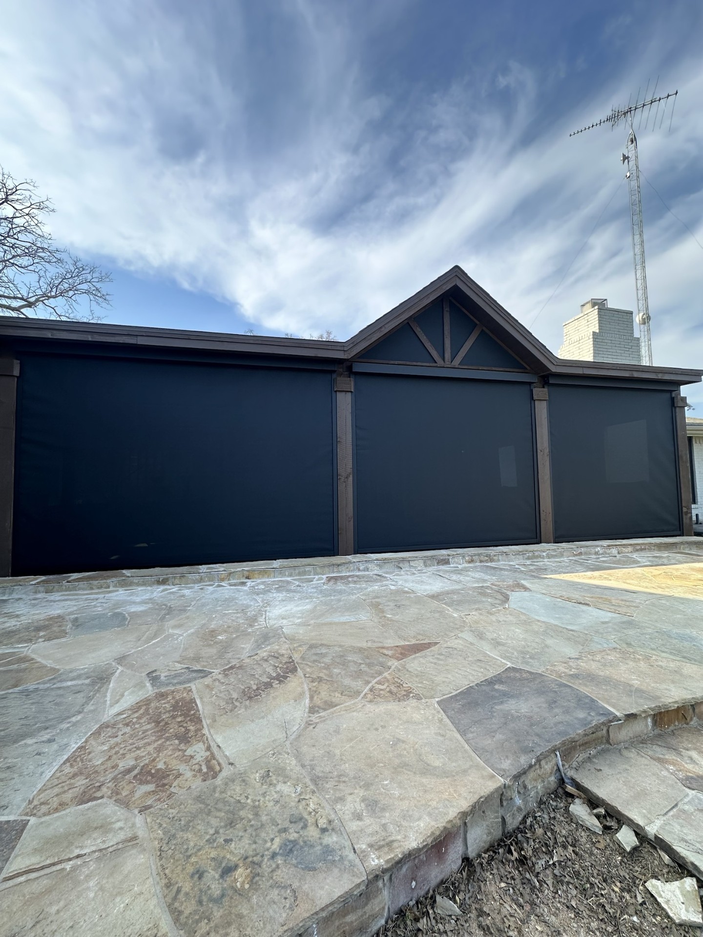 Covered patio with black exterior solar screens